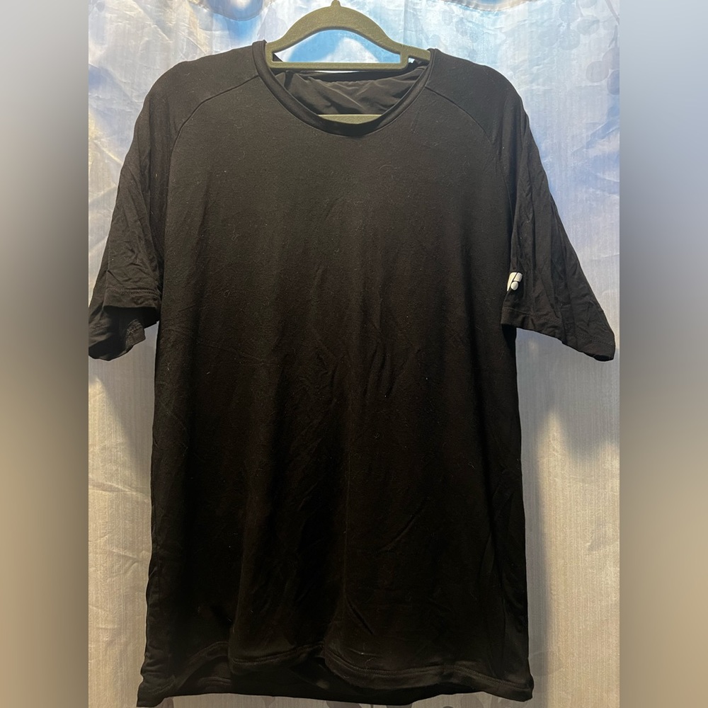 Worn once but it was the wrong size for me. Posture supportive T-shirt